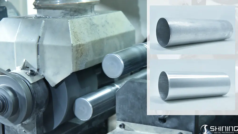 Industrial process of trimming aluminum cylinders to size and brushing the surface for perfect smoothness.