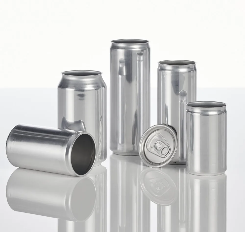 Sleek Can vs Slim Can vs Standard Can: What’s the Real Difference? 1 Various sizes of empty aluminum beverage cans including tall slim and sleek profiles on a reflective surface